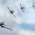 five black and gray jets close-up photography