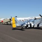 propeller planes parked at airport